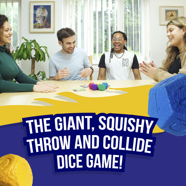 Four people playing Asteroid Dice game with giant, squishy dice on a table.
